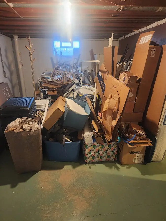 Roll-off dumpster container at job site for 2 Yard Dumpster Rental in Marshall